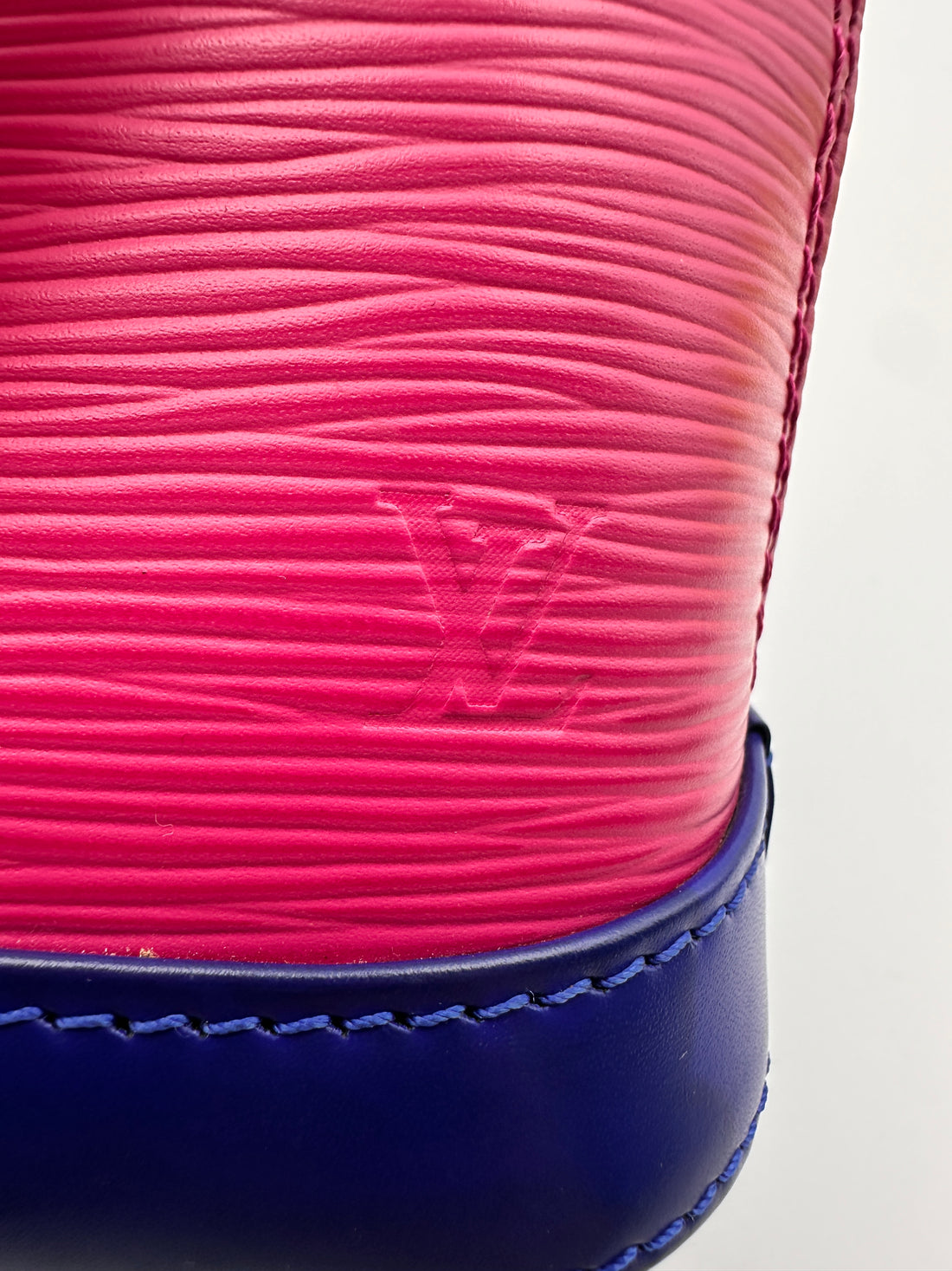 Louis Vuitton Epi Nano Alma Bag in a Pink Blue and Fushsia Colorblock Pattern LV1420