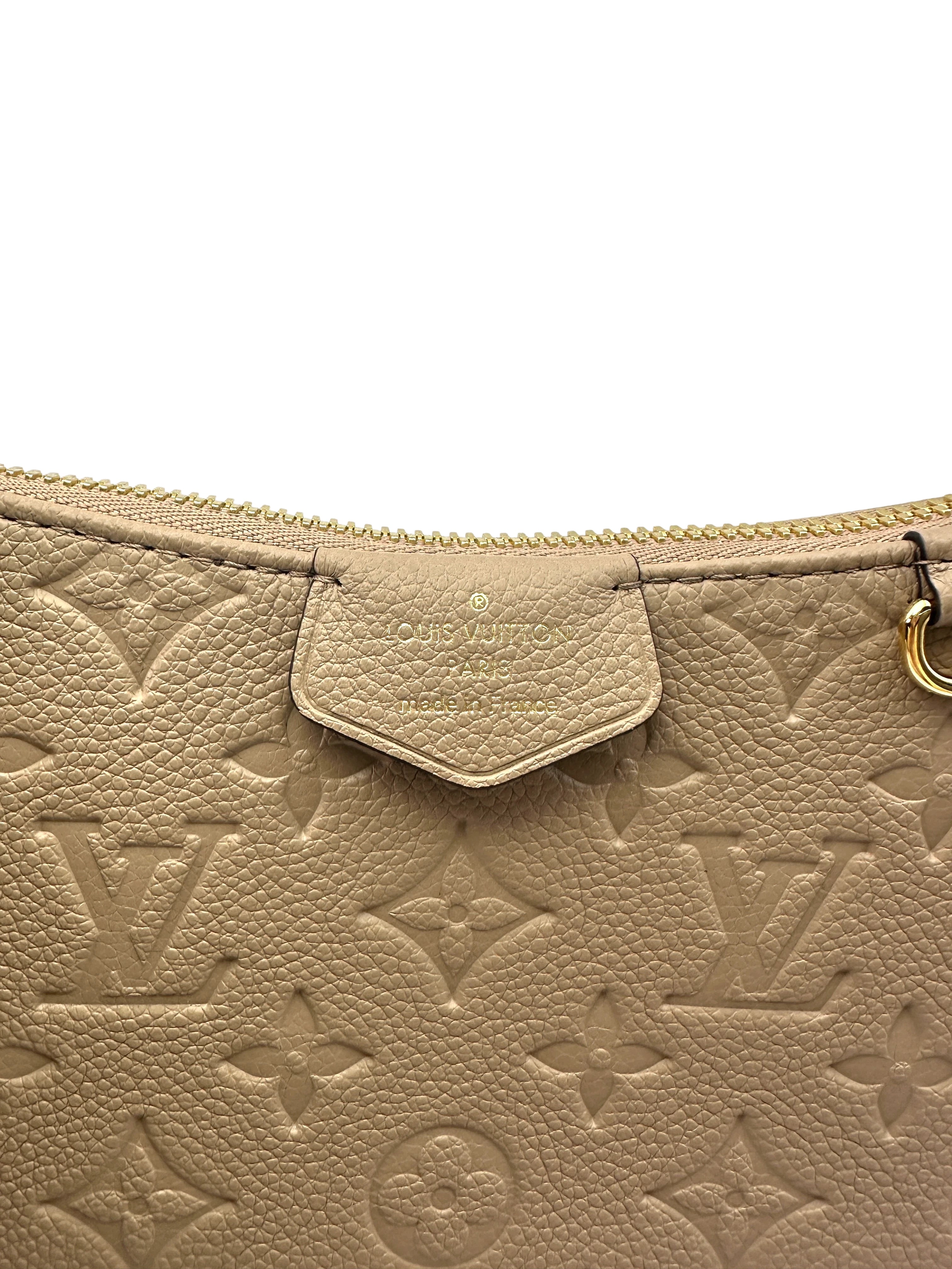 Louis Vuitton Easy Pouch On Strap White Monogram Empreinte Leather Pouch LV2062