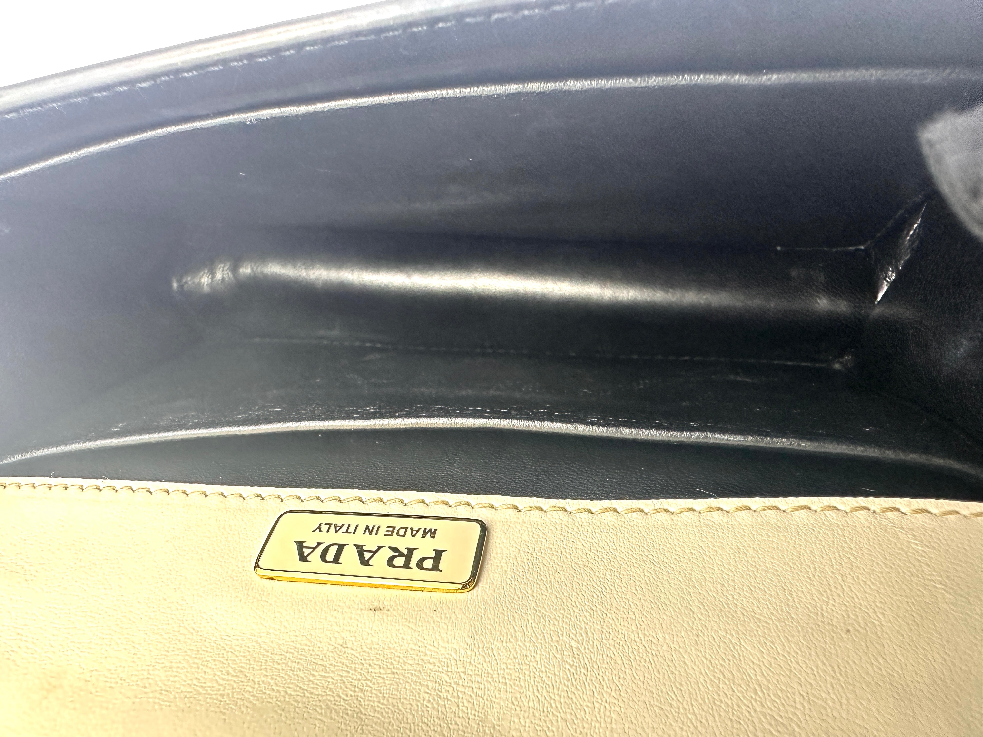 Prada Cahier  Astrology White/Black Saffiano Shoulder Bag With Gold Hardware PR210