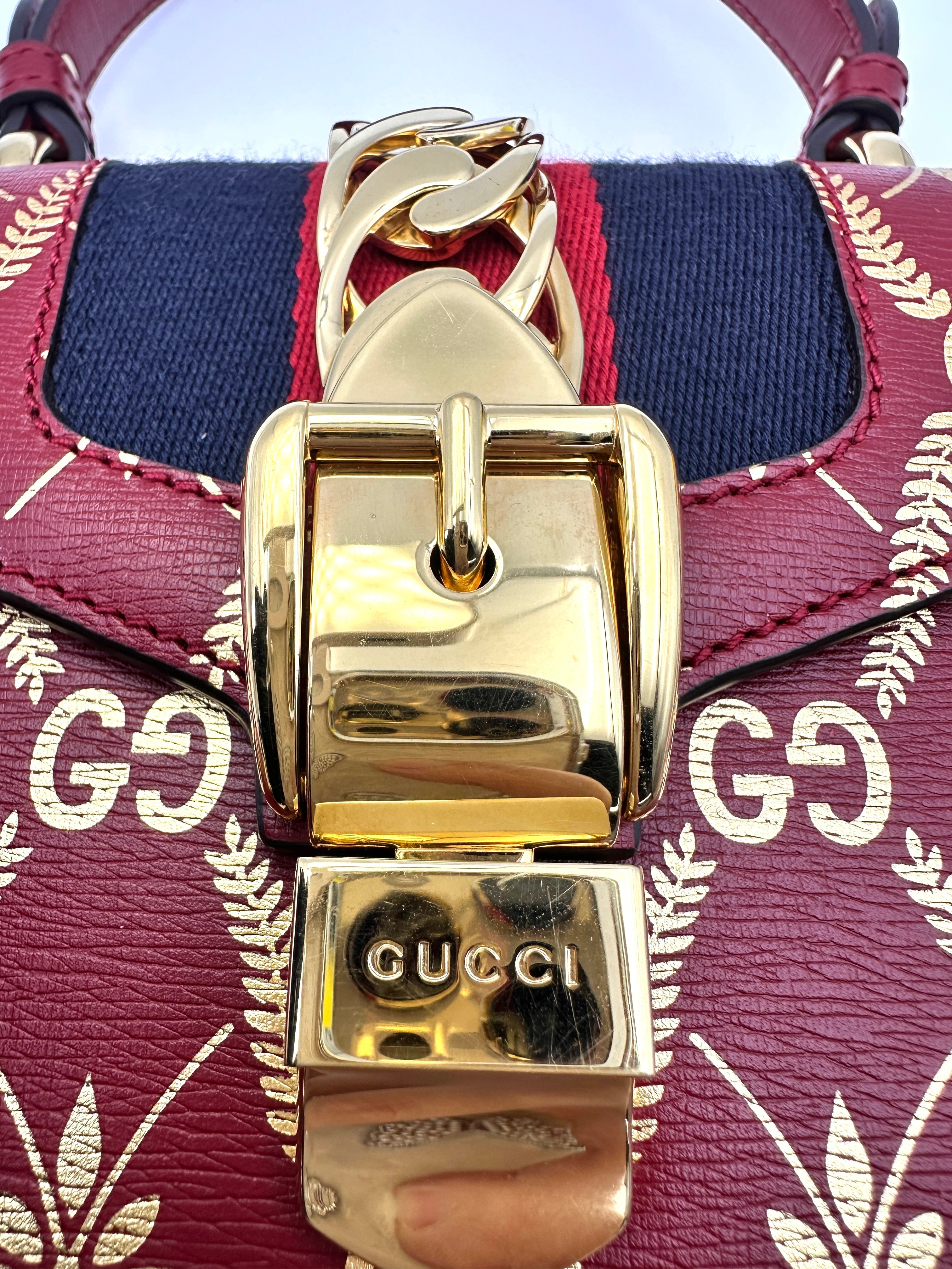 Gucci Sylvie Bee & Star Print Red Leather Top Handle Bag GG777