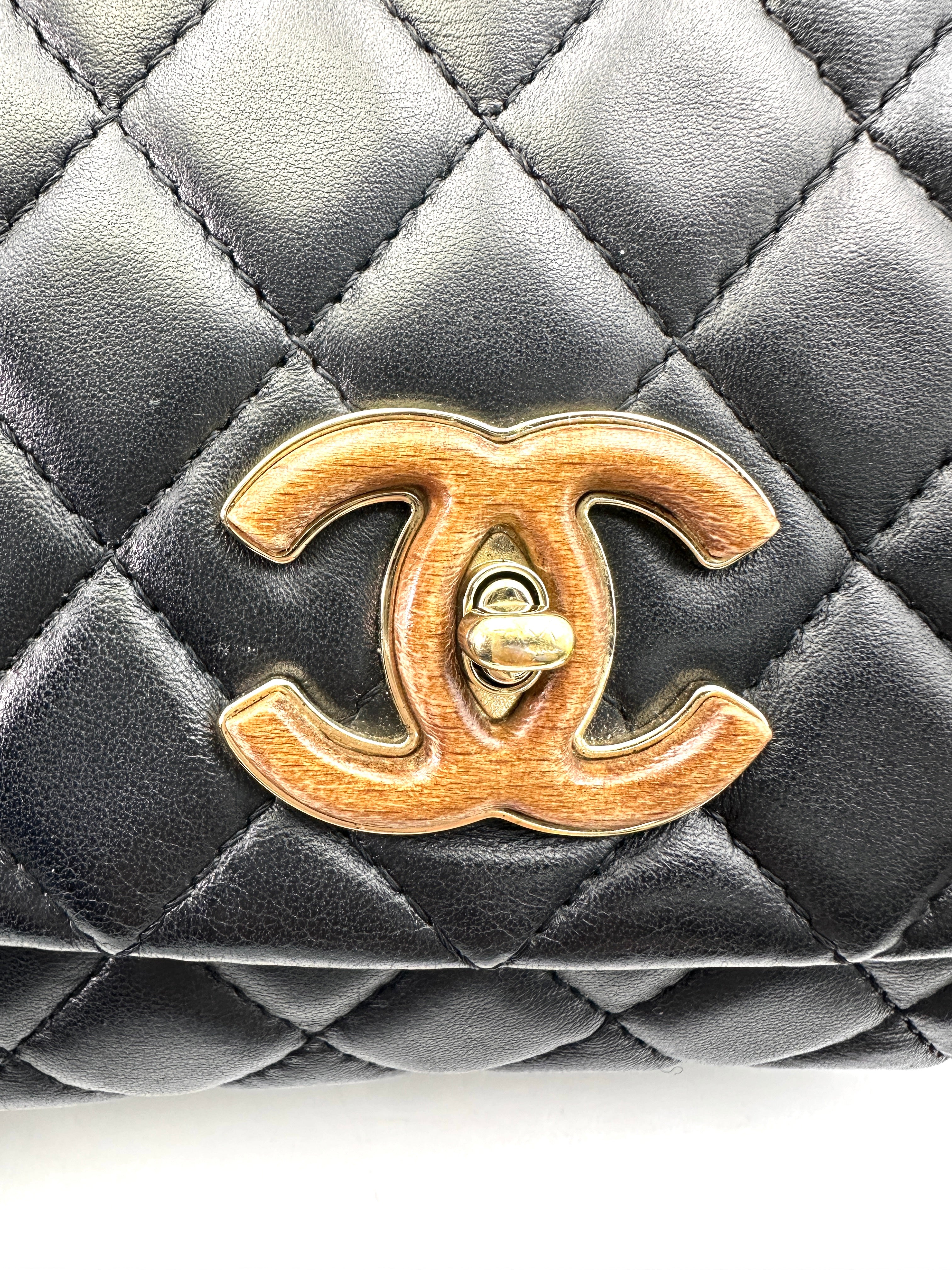 Chanel "Knock On Wood" Black Quilted Leather Top Handle Flap Bag(26***01) IRIS142