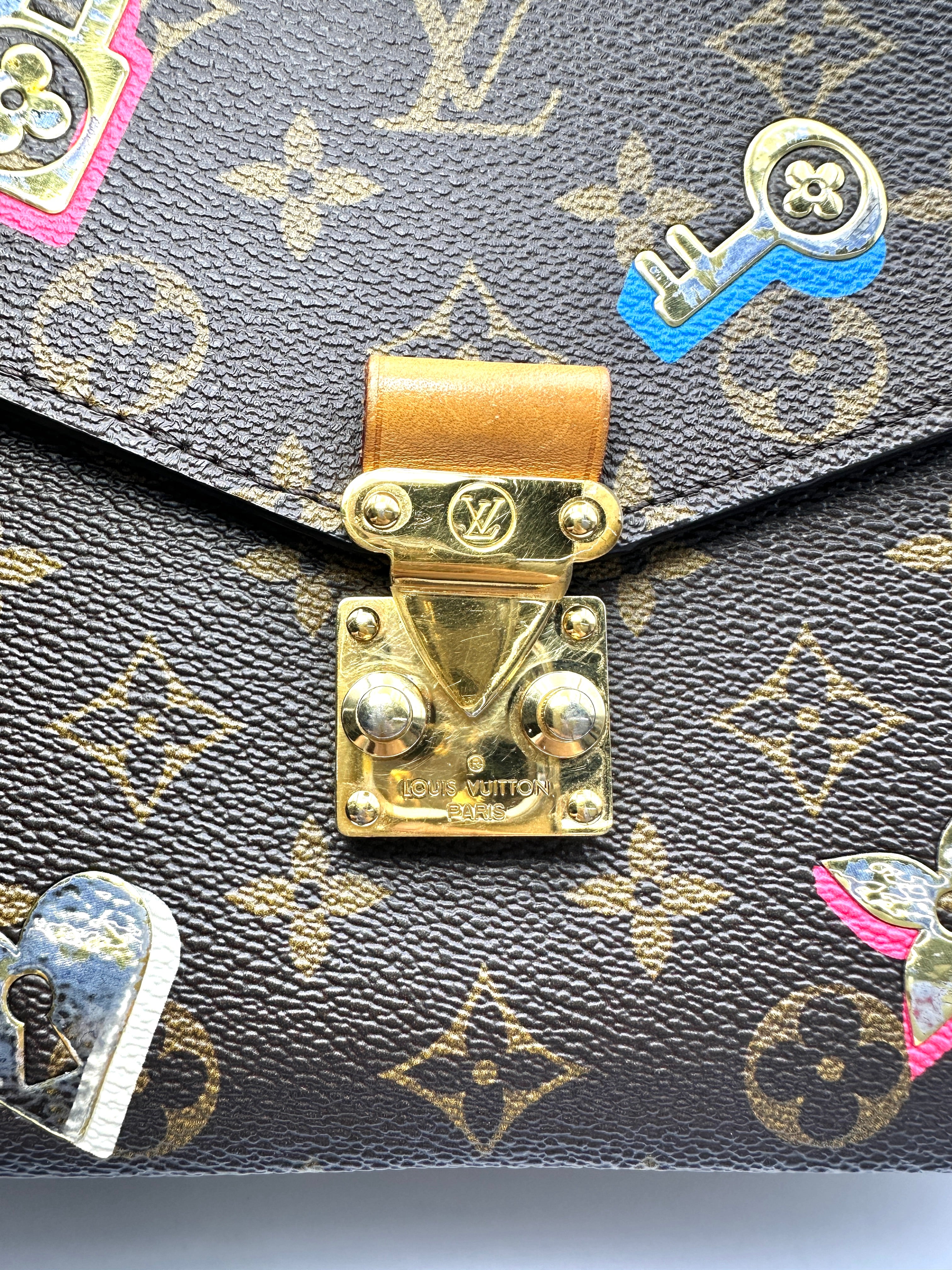 Louis Vuitton Love Lock Monogram Canvas Pochette Metis LV3071
