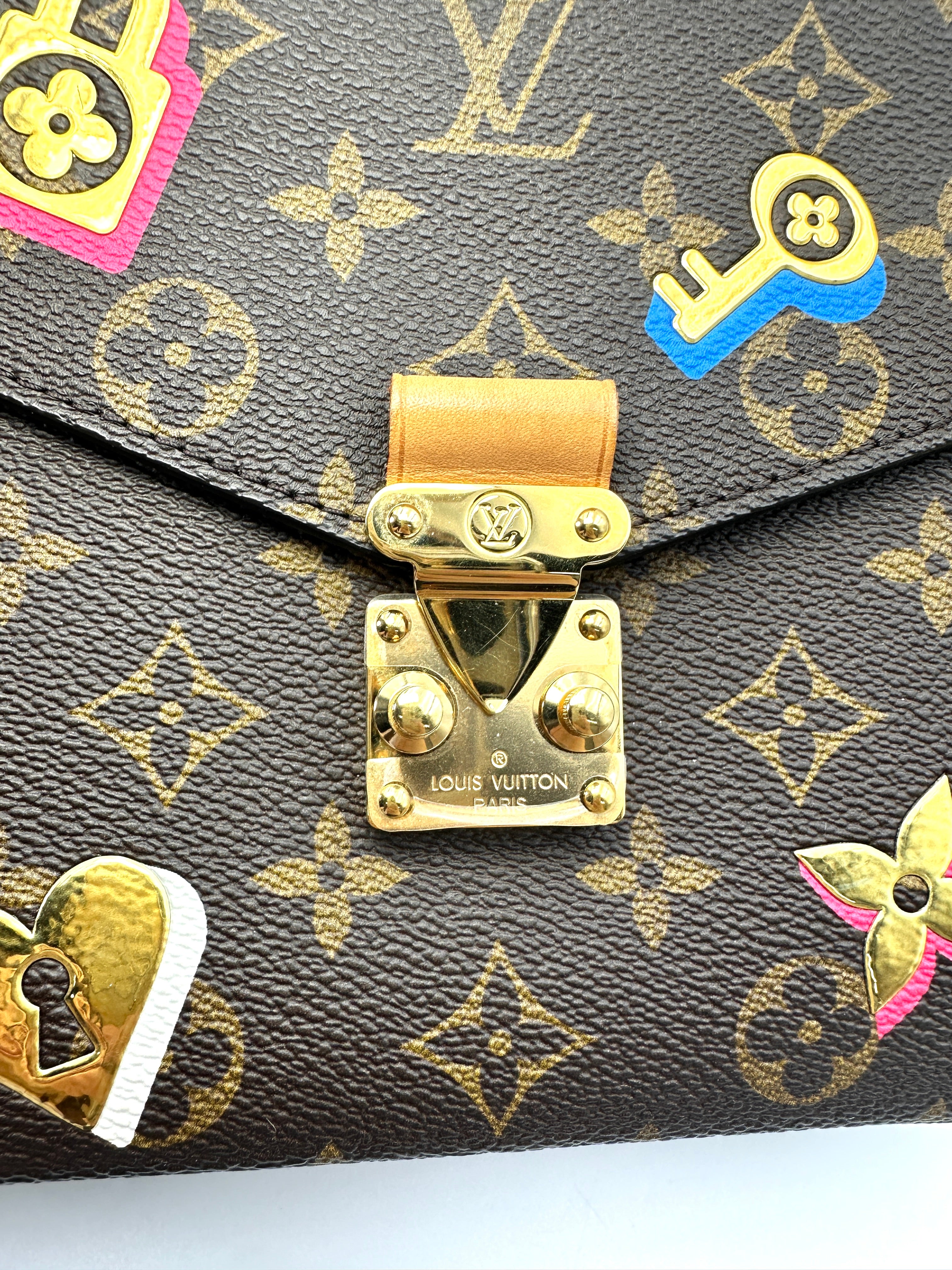 Louis Vuitton Love Lock Monogram Canvas Pochette Metis LV3087