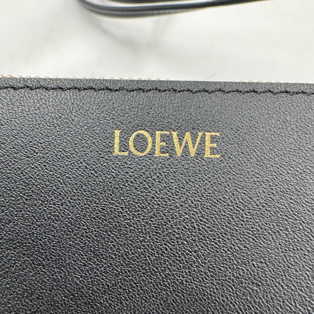 Loewe Puzzle Fold Leather pouch in black