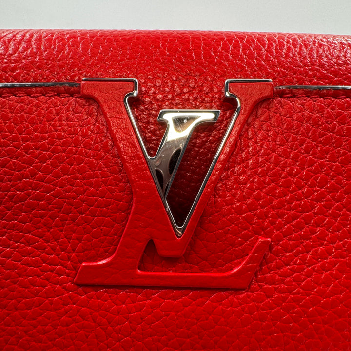 Louis Vuitton Taurillon Capucines PM Handbag red in leather