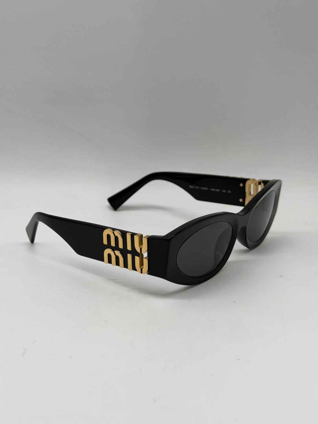 Miu Miu Oval Frame Sunglass