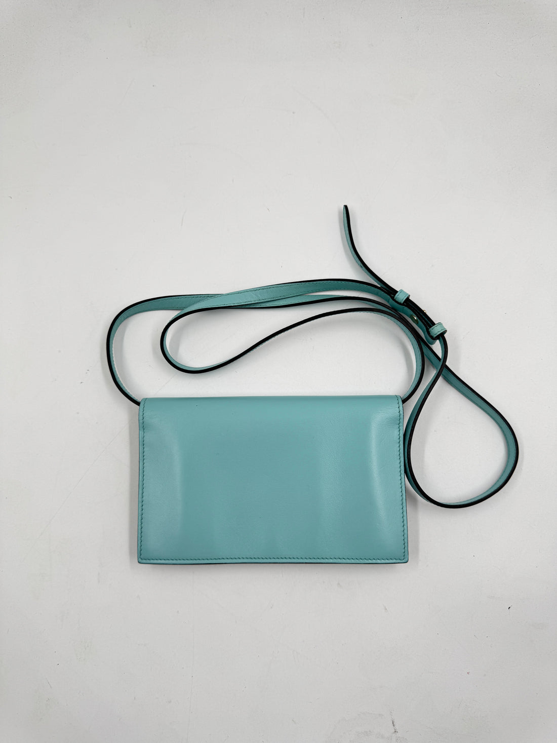 Gucci Marmont Super Mini Bag in a turquoise or light blue color