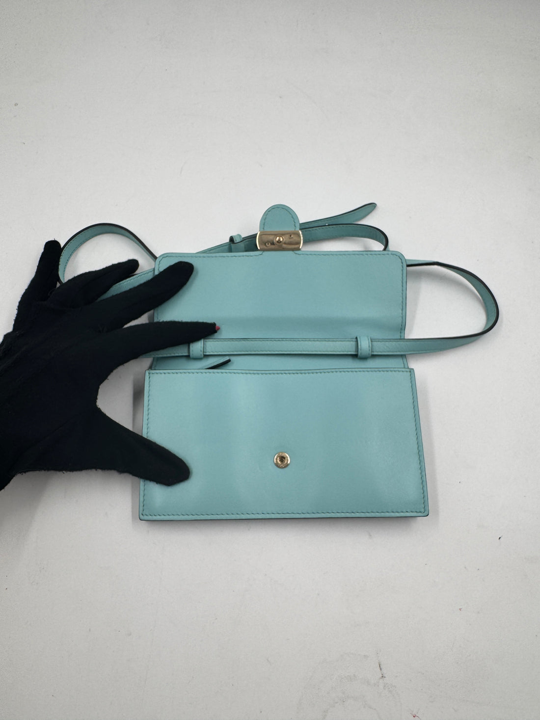 Gucci Marmont Super Mini Bag in a turquoise or light blue color