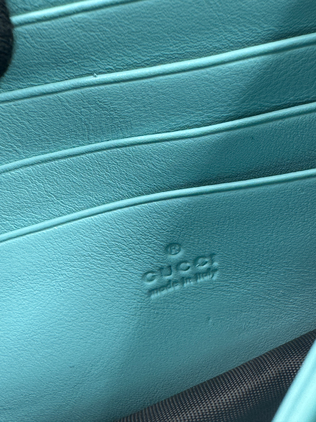 Gucci Marmont Super Mini Bag in a turquoise or light blue color